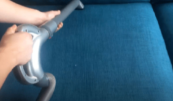 vacuum your couch to remove dirt